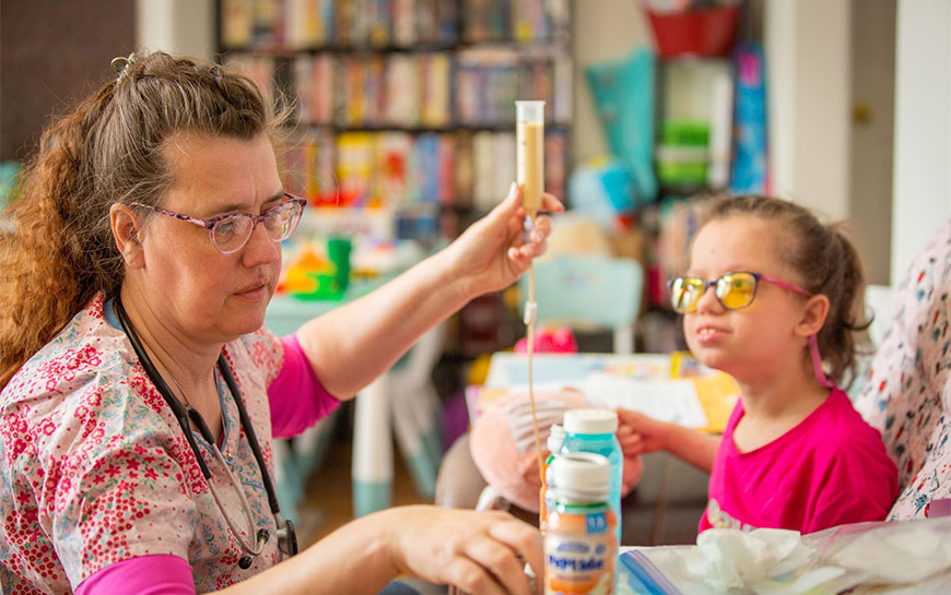Caregiver assiting a child